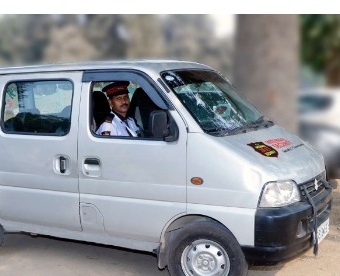 A.S.S. Security patrol vehicle Maruti Omni van with branding